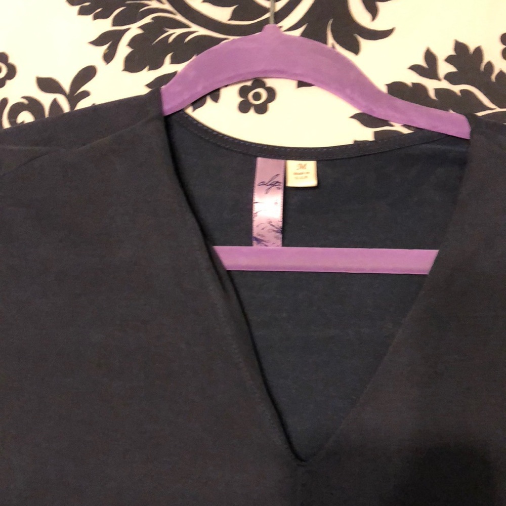 Francesca’s medium t shirt dress includes pockets